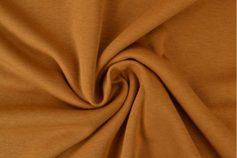 Alpenfleece sweaterstof donker okergeel
