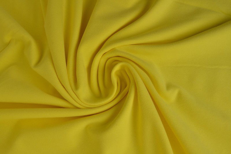 Katoen tricot geel