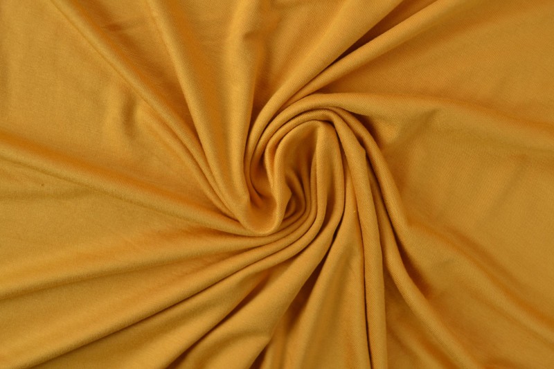 Viscose tricot okergeel